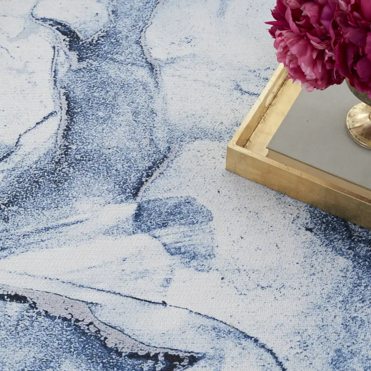 5' X 7' Ivory and Blue Abstract Power Loom Area Rug