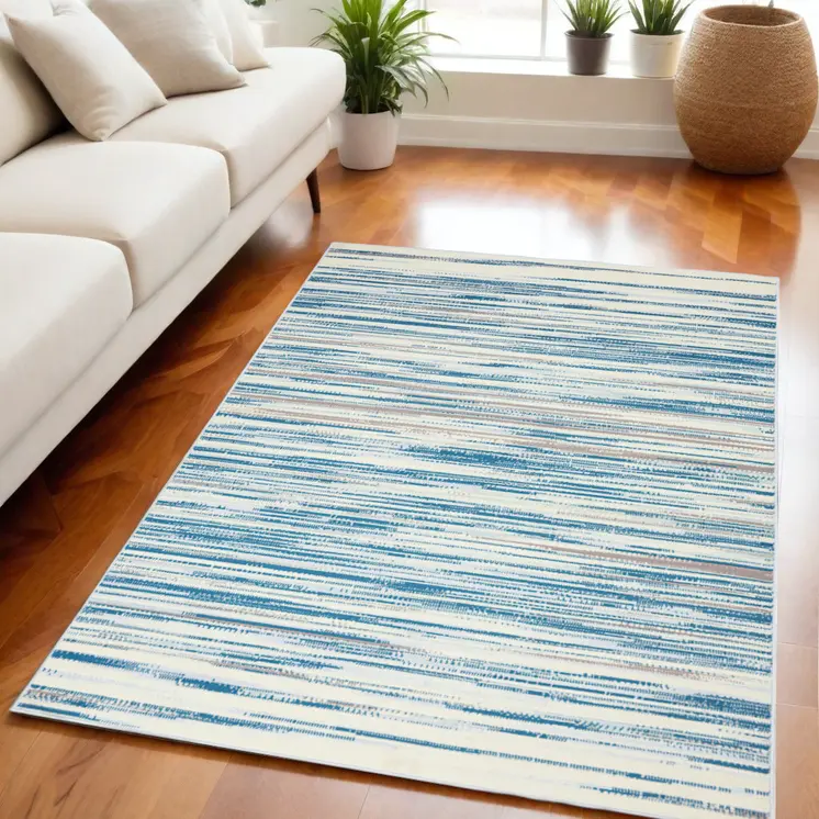 5' X 7' Ivory Blue and Gray Abstract Non Skid Area Rug