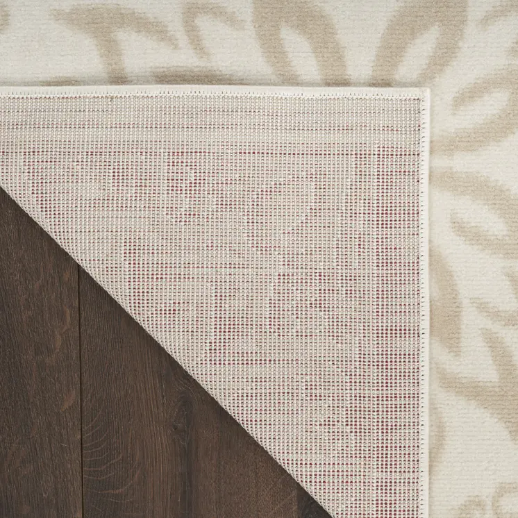5' X 7' Beige and Ivory Floral Non Skid Area Rug
