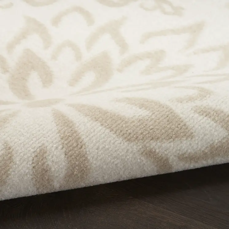 5' X 7' Beige and Ivory Floral Non Skid Area Rug