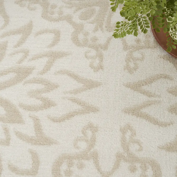 5' X 7' Beige and Ivory Floral Non Skid Area Rug