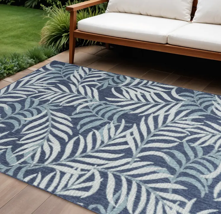 6' X 9' Navy Blue And Ivory Palm Leaf Indoor Outdoor Area Rug