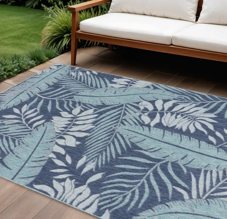 6' X 9' Navy Blue And Ivory Palm Leaf Indoor Outdoor Area Rug