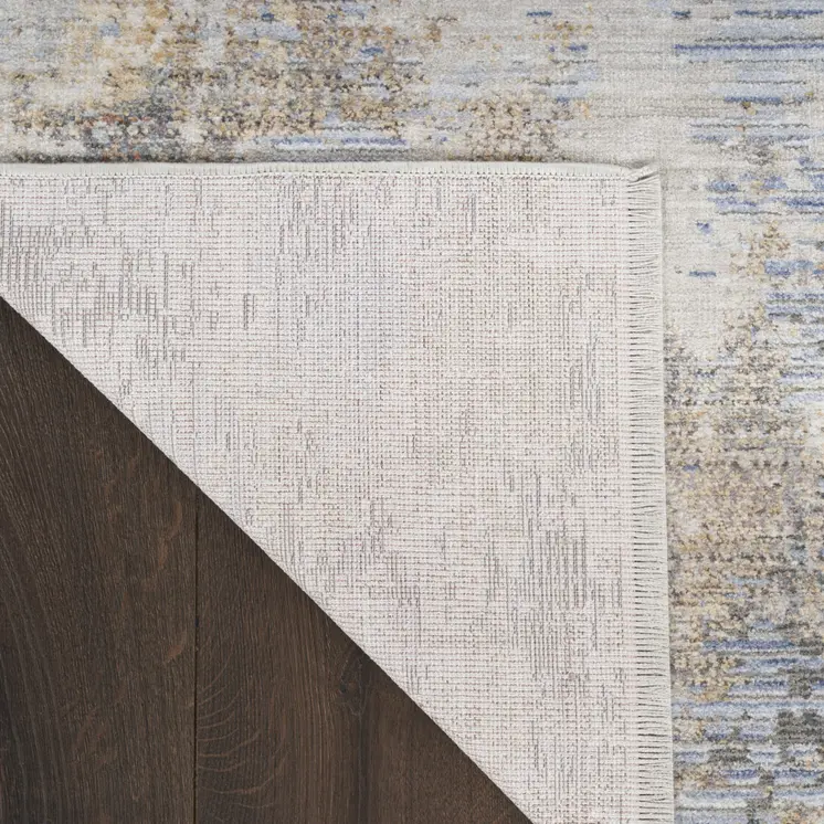 5' X 8' Beige Blue and Gray Abstract Area Rug With Fringe