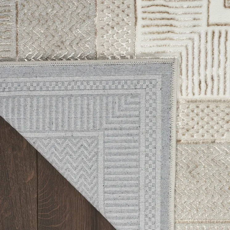 5' X 7' Beige and Ivory Geometric Non Skid Area Rug