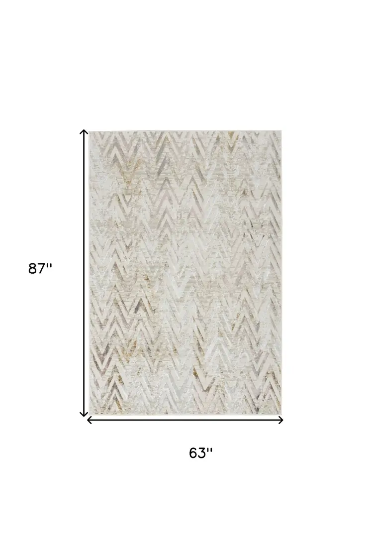 5' X 7' Beige Blue and Ivory Chevron Distressed Non Skid Area Rug