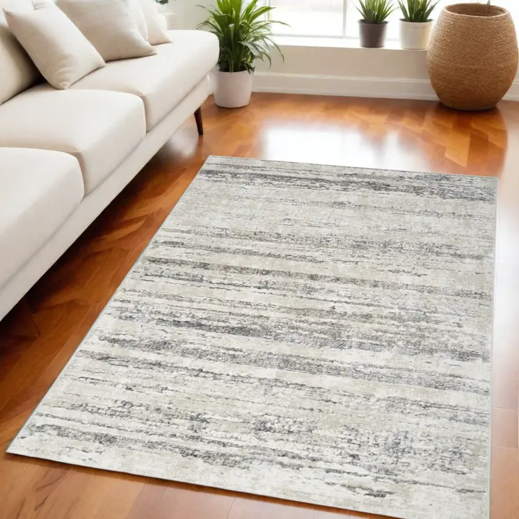 5' X 7' Cream and Gray Abstract Non Skid Area Rug