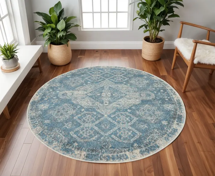 8' Ivory And Light Blue Geometric Distressed Round Rug