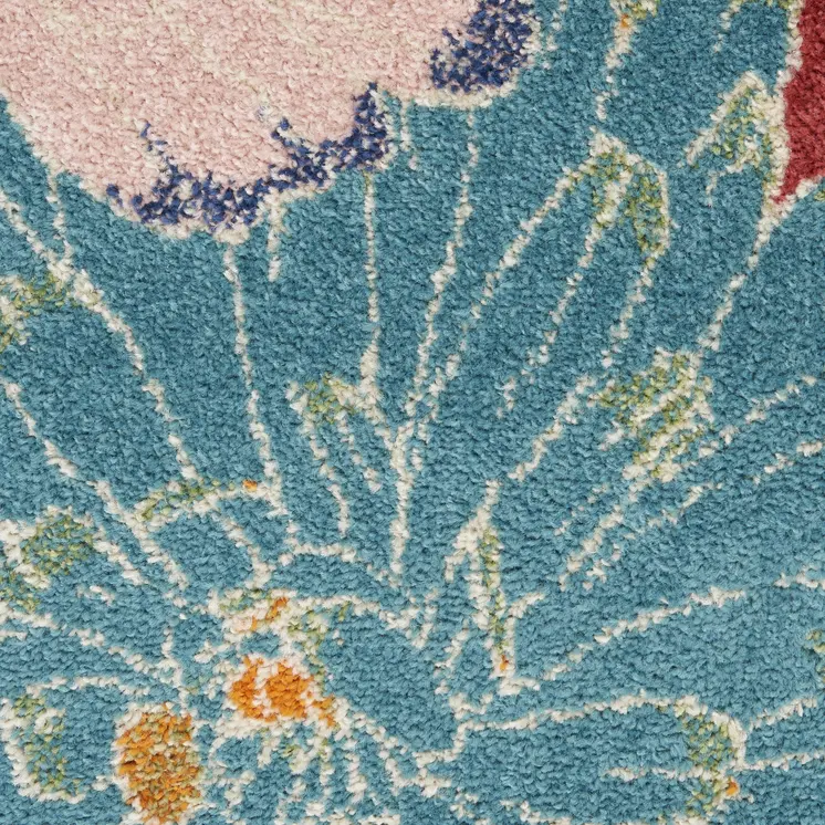 5' X 7' Orange and Red Floral Power Loom Area Rug