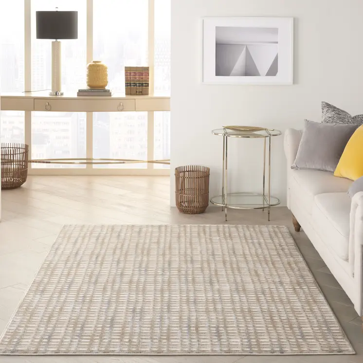 5' X 7' Beige And Blue Abstract Indoor Outdoor Area Rug