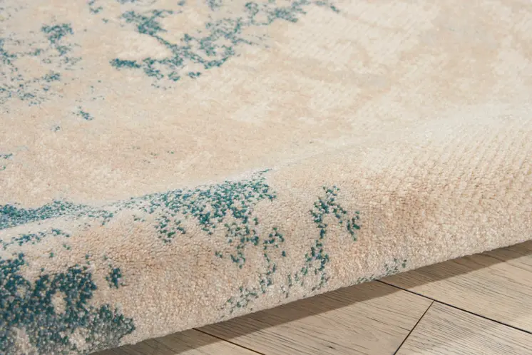 5' X 7' Teal and Ivory Abstract Non Skid Area Rug