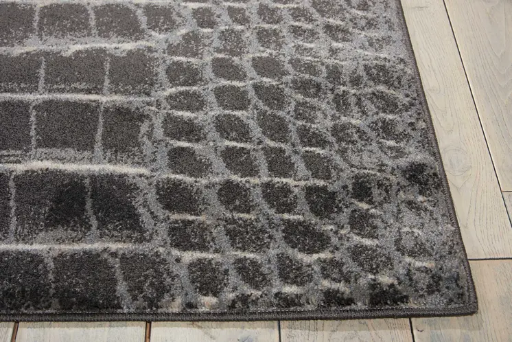 5' X 7' Beige Charcoal and Cream Animal Print Distressed Non Skid Area Rug