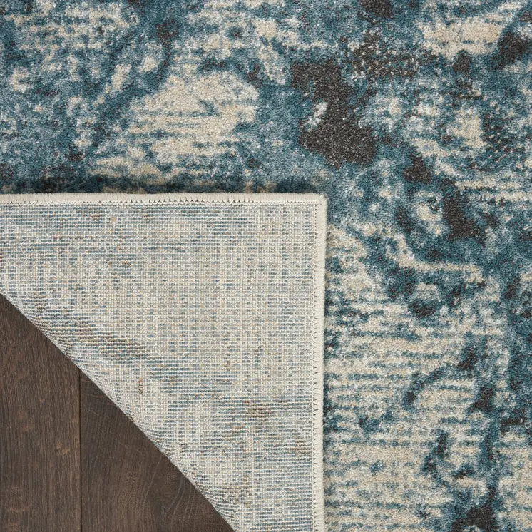 5' X 7' Teal and Ivory Abstract Non Skid Area Rug