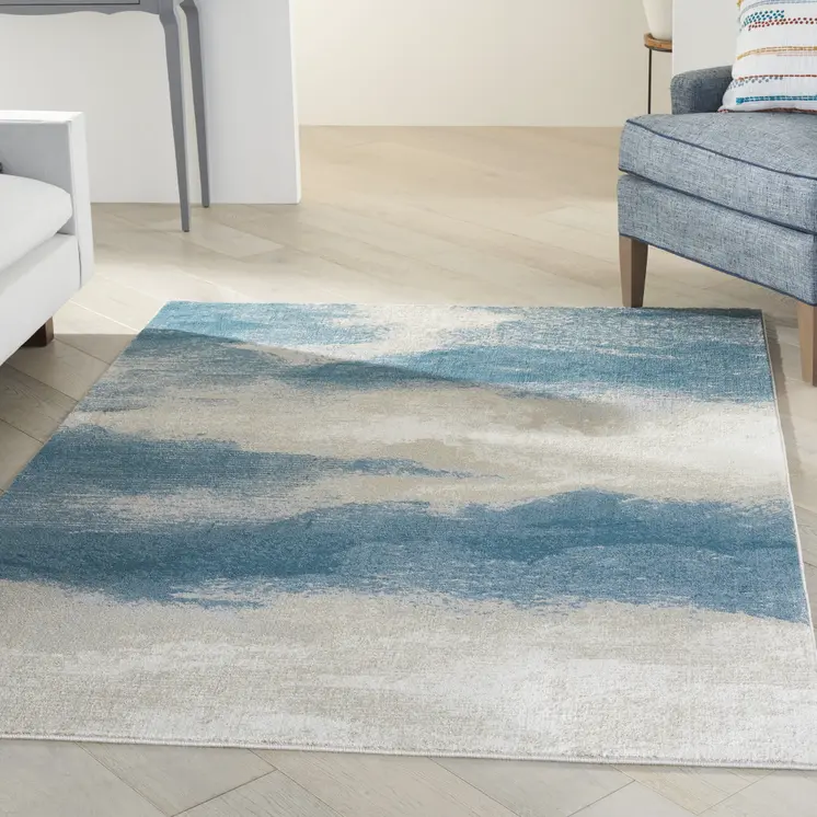 5' X 7' Teal and Ivory Abstract Non Skid Area Rug