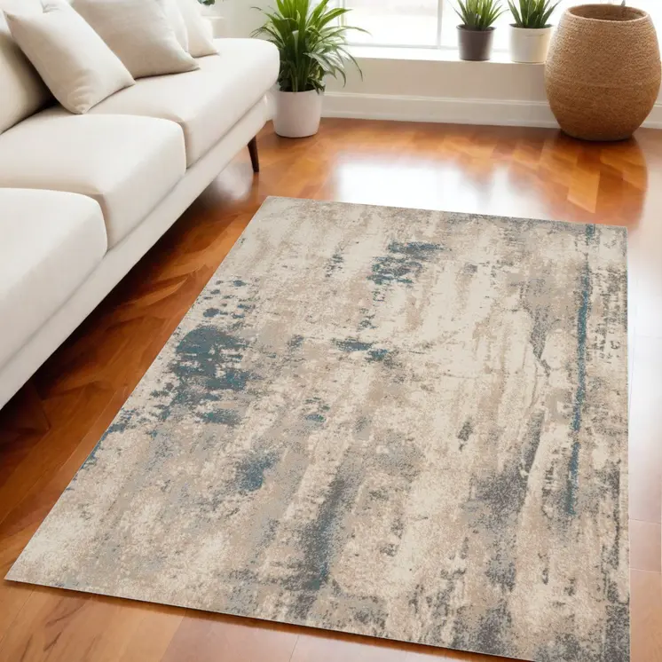 5' X 7' Teal and Ivory Abstract Non Skid Area Rug