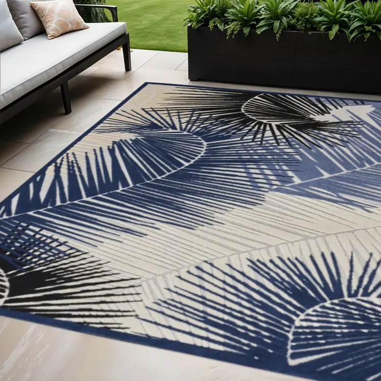 5' X 7' Navy Blue Ivory And Black Palm Leaf Indoor Outdoor Area Rug