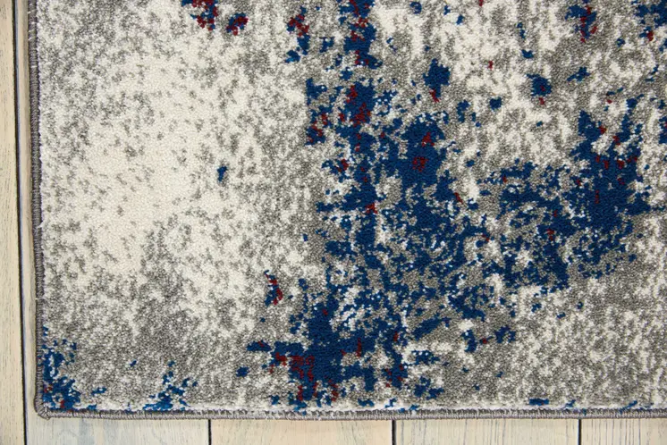 5' X 7' Ivory Red and Blue Abstract Non Skid Area Rug