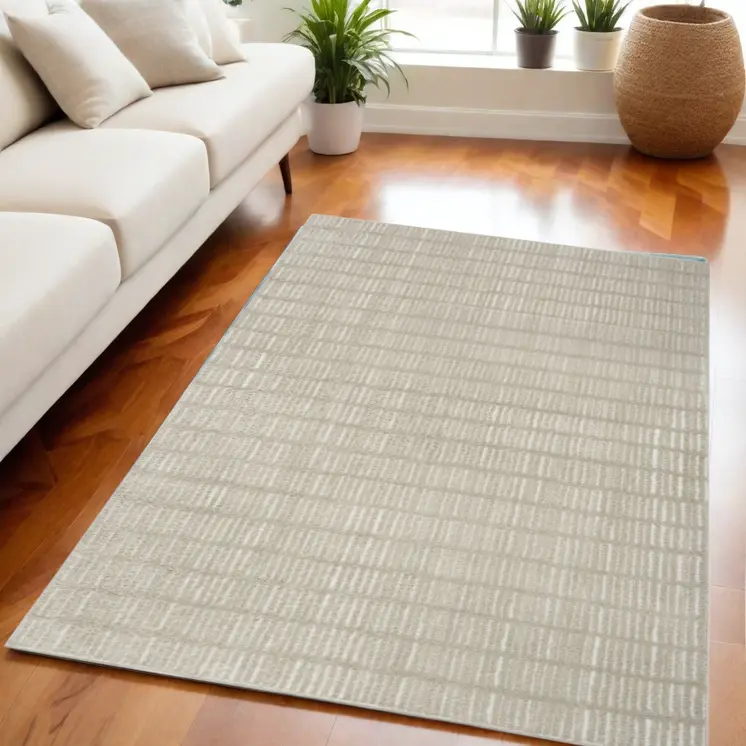 5' X 7' Gray and Ivory Abstract Area Rug