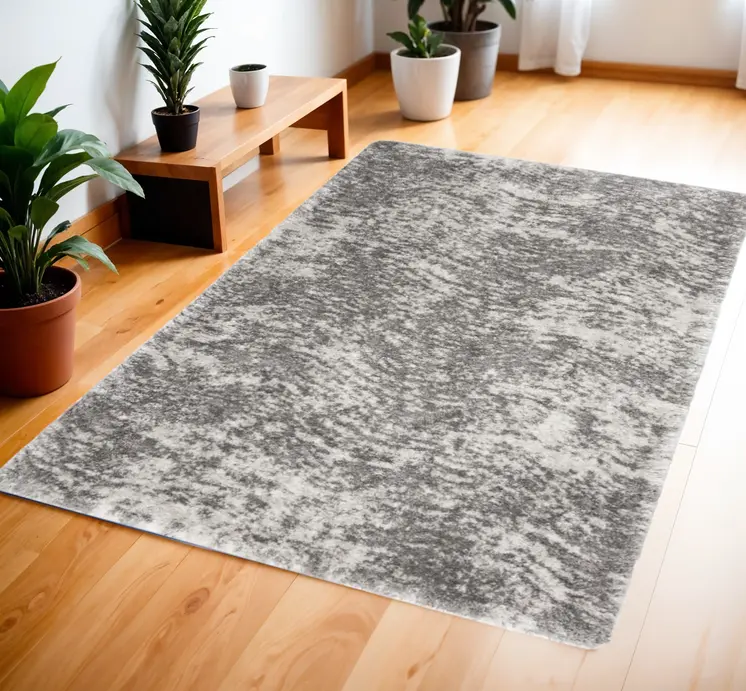 4' X 6' Charcoal and Ivory Abstract Shag Area Rug