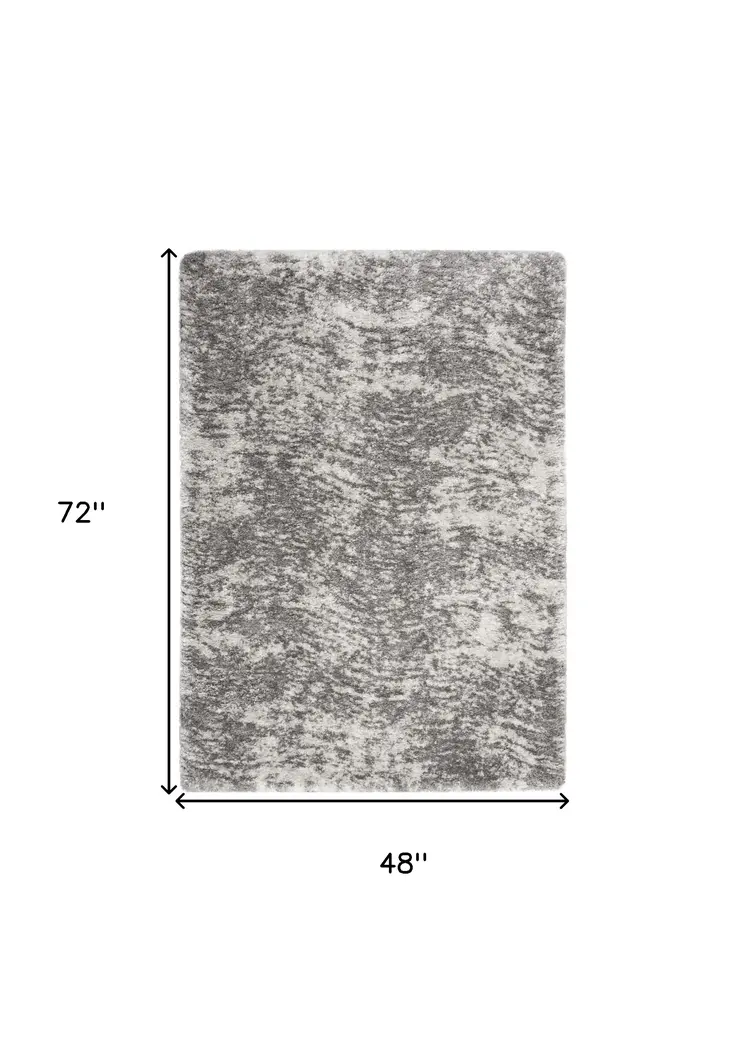 4' X 6' Charcoal and Ivory Abstract Shag Area Rug