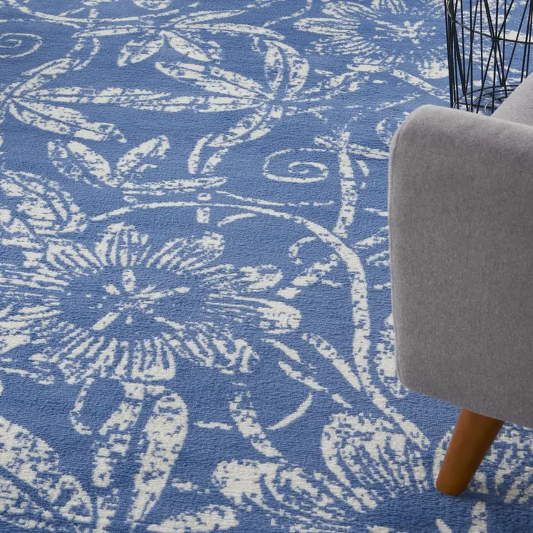 7' X 10' Ivory and Blue Floral Distressed Non Skid Area Rug