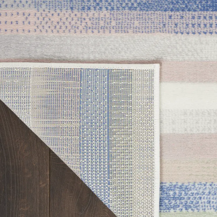 7' X 10' Ivory Tan and Blue Abstract Distressed Non Skid Area Rug