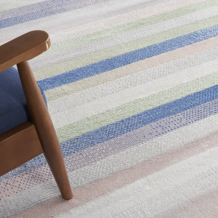 7' X 10' Ivory Tan and Blue Abstract Distressed Non Skid Area Rug