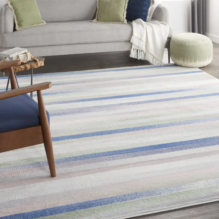 7' X 10' Ivory Tan and Blue Abstract Distressed Non Skid Area Rug