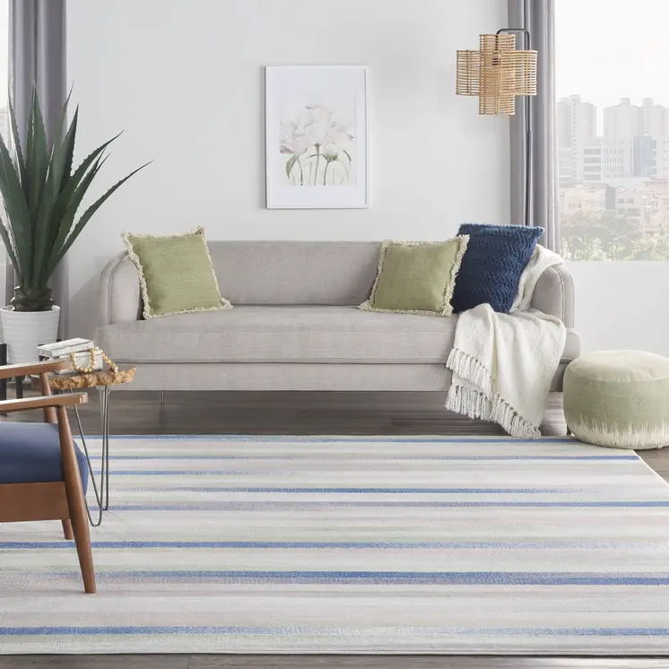 7' X 10' Ivory Tan and Blue Abstract Distressed Non Skid Area Rug