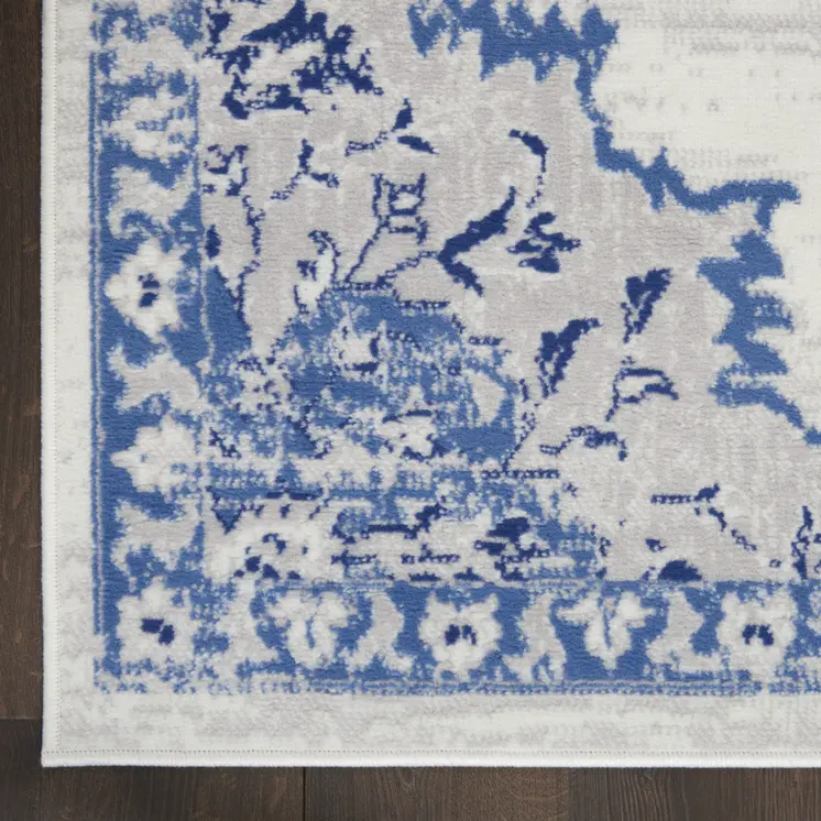 7' X 10' Ivory and Blue Floral Medallion Distressed Non Skid Area Rug