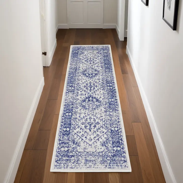 8' Ivory and Navy Blue Geometric Distressed Non Skid Runner Rug
