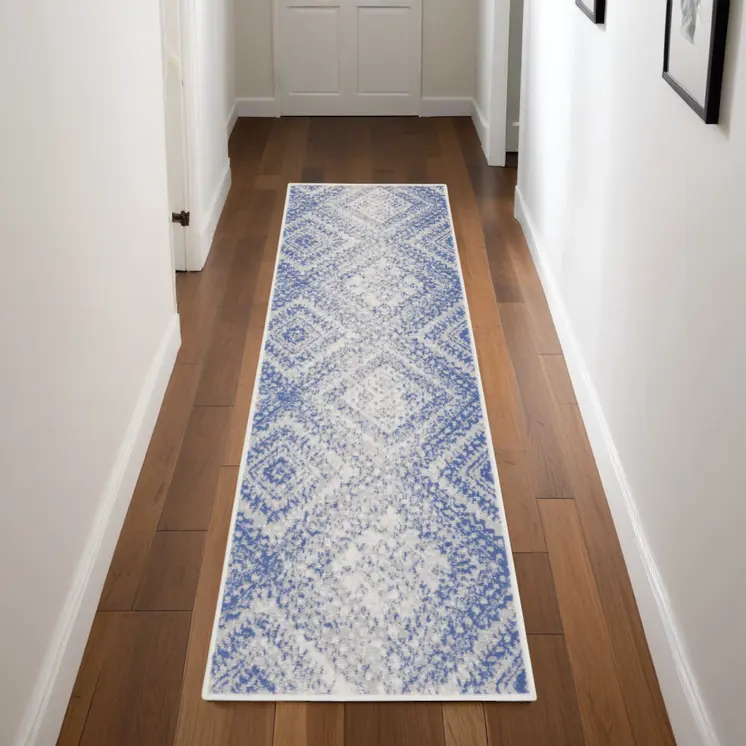 8' Ivory and Blue Geometric Distressed Non Skid Runner Rug