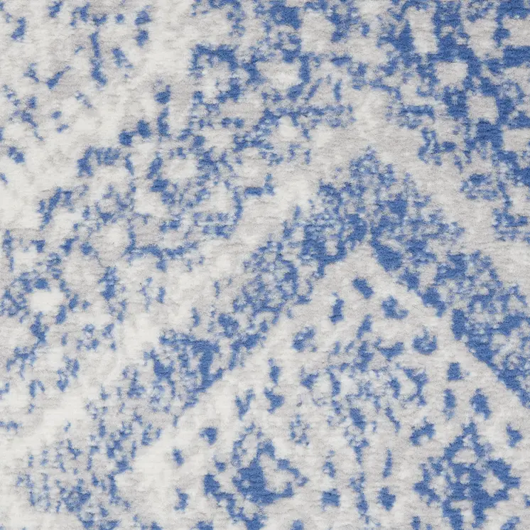 7' X 10' Ivory and Blue Abstract Distressed Non Skid Area Rug