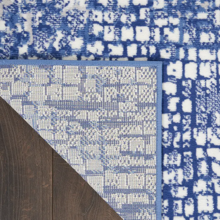 7' X 10' Ivory and Navy Blue Abstract Distressed Non Skid Area Rug