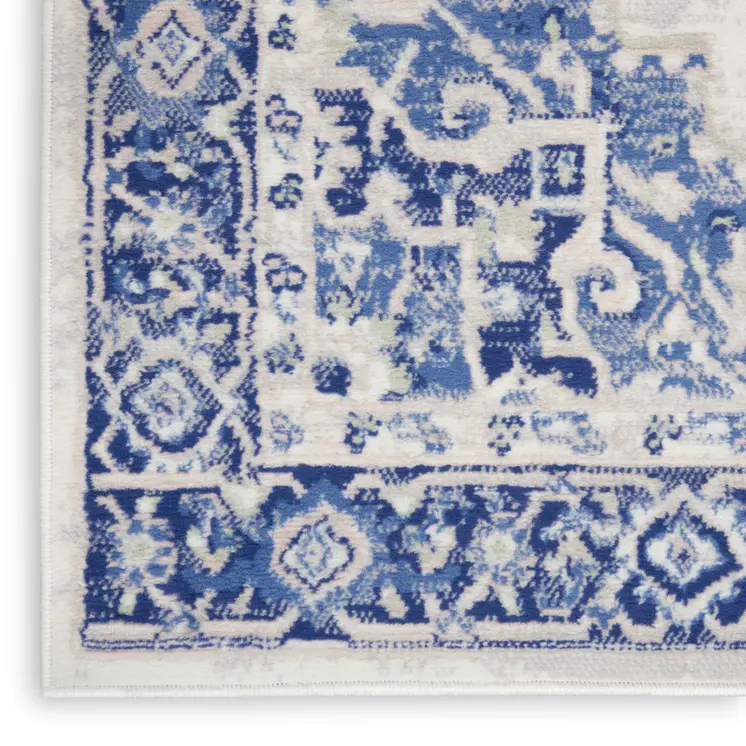 8' Ivory and Blue Floral Medallion Distressed Non Skid Runner Rug