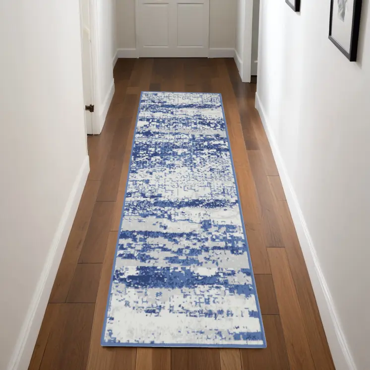 8' Ivory and Navy Blue Abstract Distressed Non Skid Runner Rug