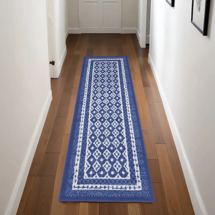 8' Ivory and Navy Blue Geometric Distressed Non Skid Runner Rug