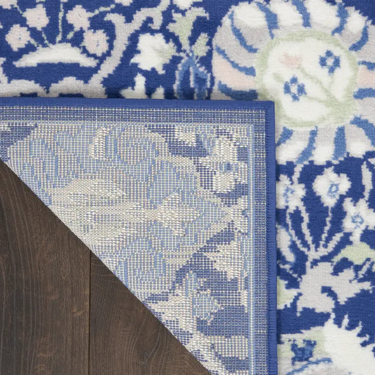 7' X 10' Navy Blue Ivory and Beige Floral Distressed Non Skid Area Rug