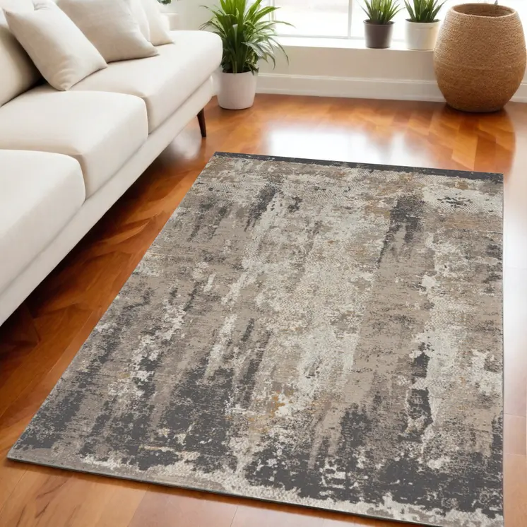 5' X 7' Cream Black and Gray Abstract Area Rug