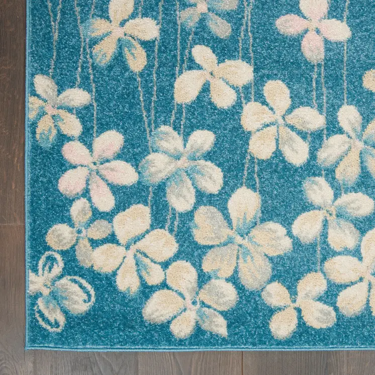 5' X 7' Turquoise and Cream Floral Area Rug