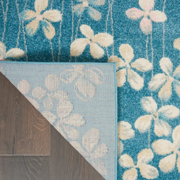 5' X 7' Turquoise and Cream Floral Area Rug