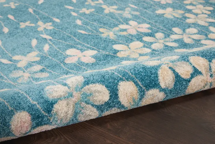 5' X 7' Turquoise and Cream Floral Area Rug