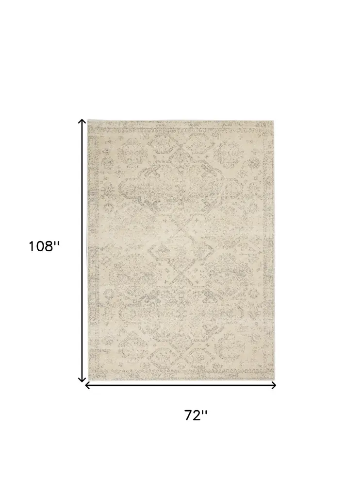 6' X 9' Beige And Gray Geometric Distressed Area Rug