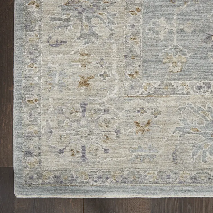 5' X 8' Beige and Blue Floral Power Loom Area Rug
