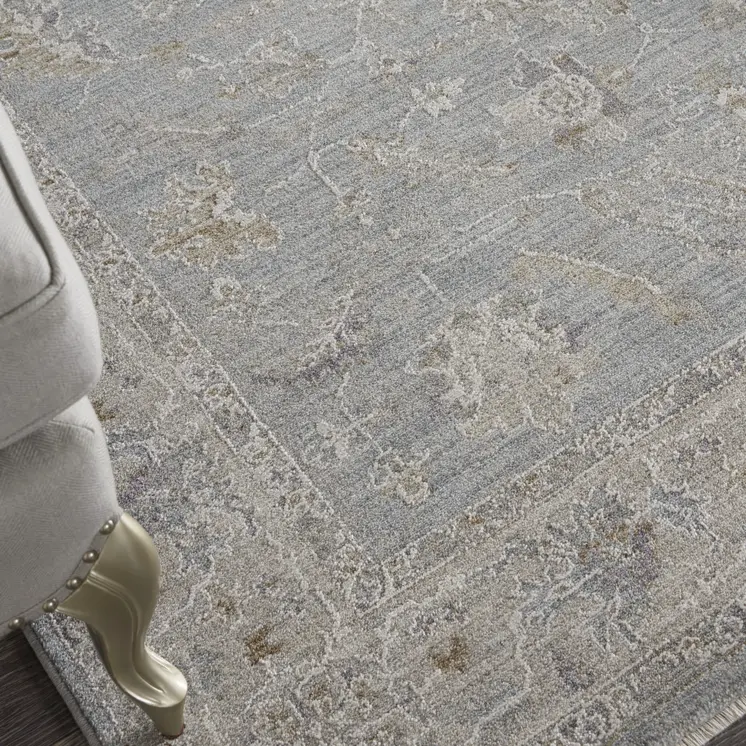 5' X 8' Beige and Blue Floral Power Loom Area Rug