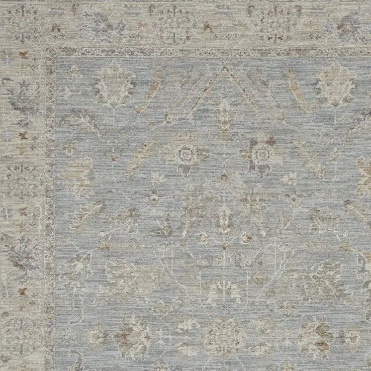 5' X 8' Beige and Blue Floral Power Loom Area Rug