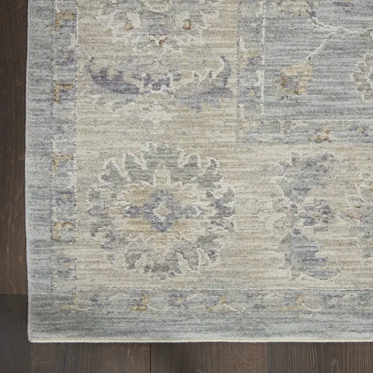 5' X 8' Beige and Blue Floral Power Loom Area Rug