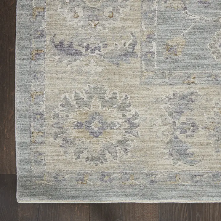 5' X 8' Beige and Blue Floral Power Loom Area Rug