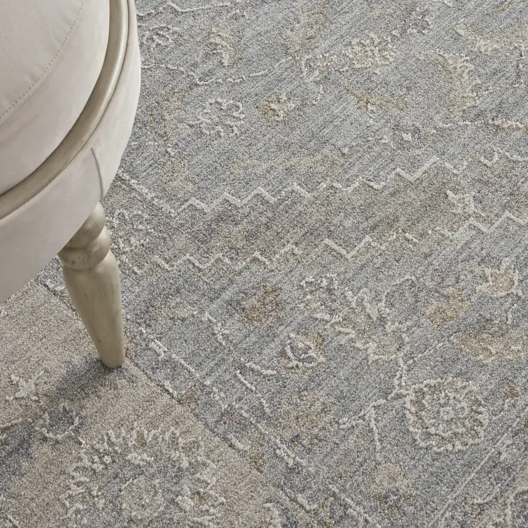 5' X 8' Beige and Blue Floral Power Loom Area Rug