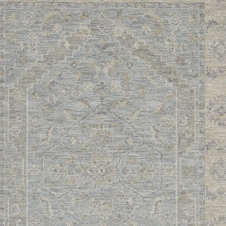 5' X 8' Beige and Blue Floral Power Loom Area Rug